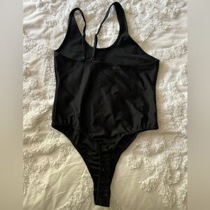 We Wore What Ladies Black Bodysuit  High Cut Thong Style Back Slanted Shoulder
